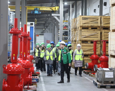Schoolchildren at rebar builders